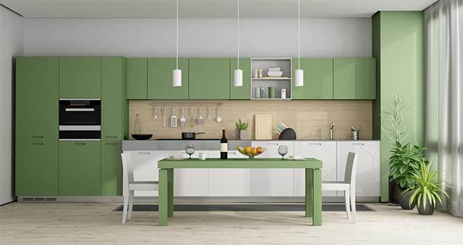 Mobili da cucina minimalisti a schermo piatto con finitura laccata verde e piano di lavoro in legno massello